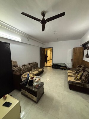 Living Room in 1 BHK Apartment at Lodha Palava Downtown, Dombivli East – for Rent