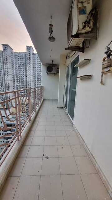 Balcony in 2 BHK Apartment at Mahagun Moderne, Sector 78 – for Rent
