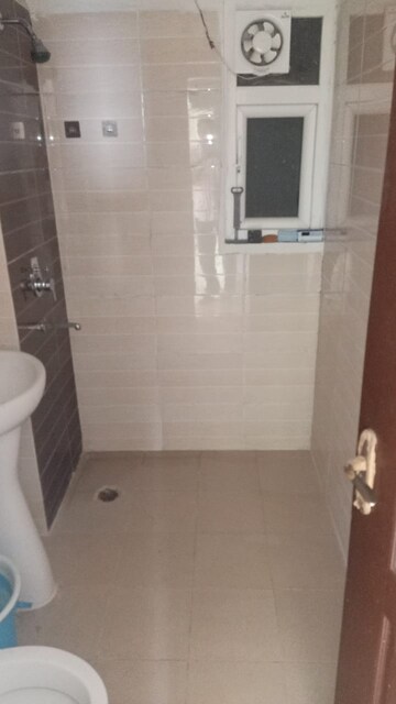 Bathroom in 3 BHK Apartment at Amrapali Zodiac, Sector 120 – for Sale
