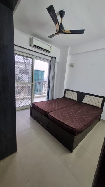 Bedroom in 2 BHK Apartment at Mahagun Moderne, Sector 78 – for Rent