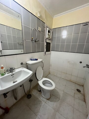 Bathroom in 2 BHK Builder Floor at Hong Kong Bazaar, Sector 57 – for Rent