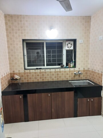 Kitchen in 1 BHK Apartment at Prasad Apartment Dahanukar Colony, Kothrud – for Sale