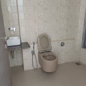 Bathroom in 2 BHK Apartment at UCT Unique Serenity, Shivaji Park – for Sale