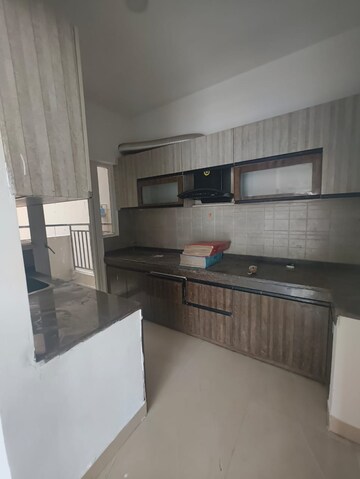 Kitchen in 2 BHK Apartment at Gulshan Bellina, Sector 16 Greater Noida – for Sale