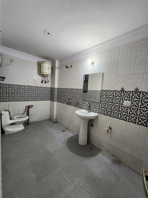Bathroom in 3 BHK Builder Floor at Chattarpur – for Rent