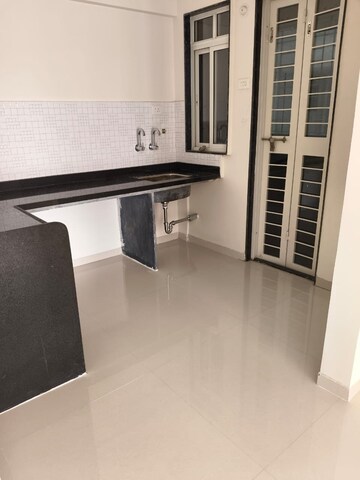 Kitchen in 2 BHK Apartment at Basil Mondale, Mundhwa – for Rent