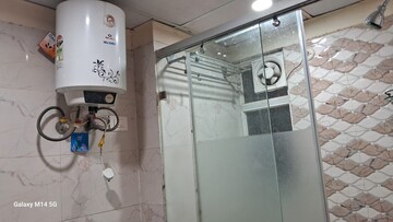 Bathroom in 2 BHK Apartment at Sangwan Heights, Raj Nagar Extension – for Sale