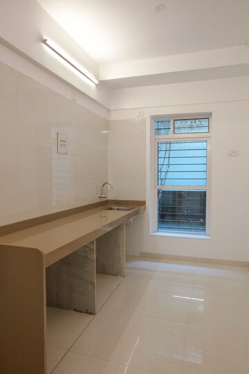 Kitchen in 1 BHK Apartment at Dosti West County, Balkum Pada – for Sale