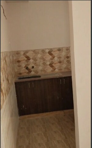 Kitchen in 2 BHK Apartment at Amrapali Golf Homes, Sector 4 Greater Noida – for Rent