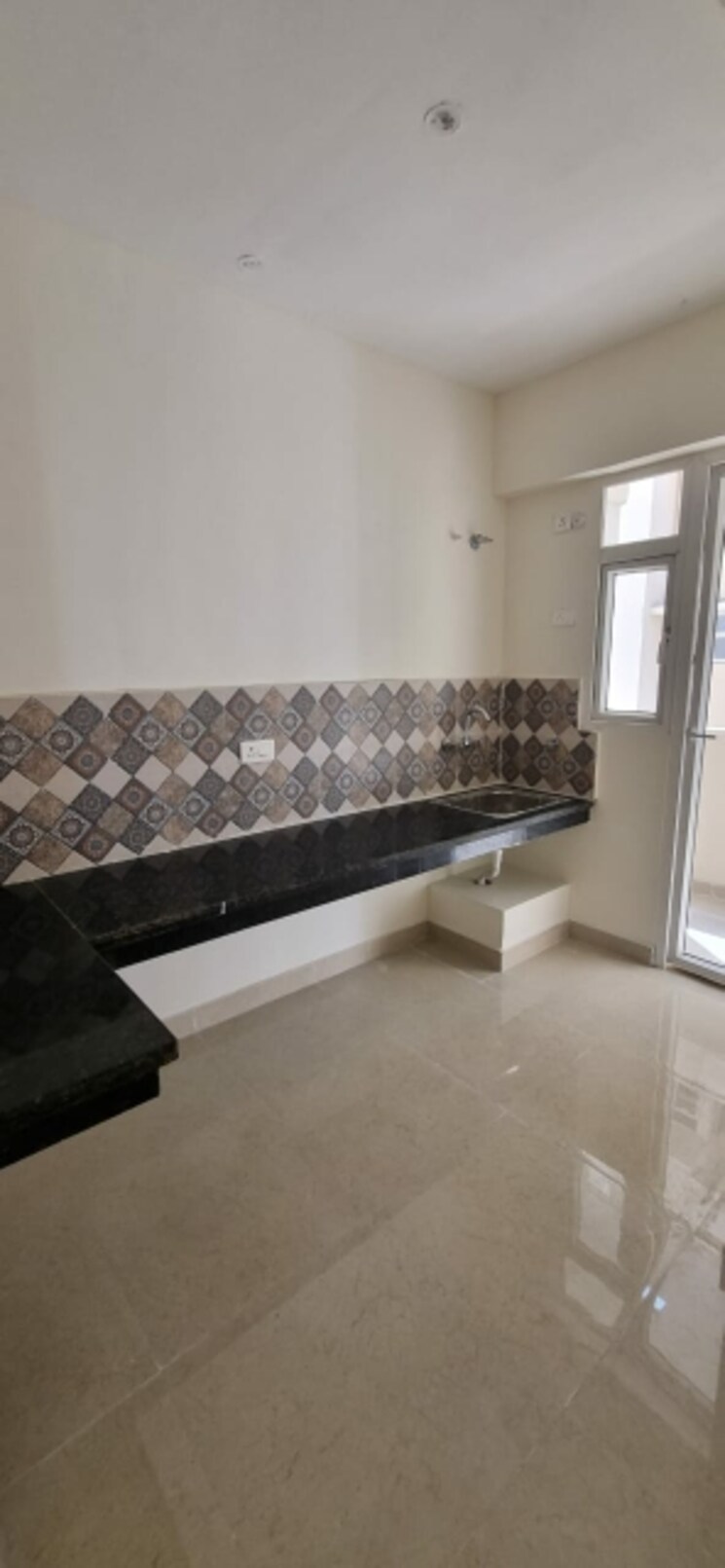 Kitchen, signature-the-millennia-3 2 Bedroom 687 Sq.Ft. Apartment In Sector 37d Gurgaon 9407186