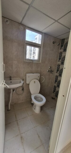 Bathroom in 2 BHK Apartment at Signature The Millennia 3, Sector 37d – for Rent