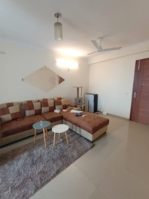 Living Room in 2 BHK Apartment at Ansal API Celebrity Gardens, Sushant Golf City – for Rent