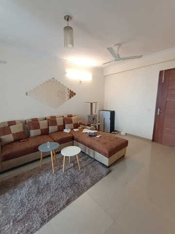 Living Room in 2 BHK Apartment at Ansal API Celebrity Gardens, Sushant Golf City – for Rent