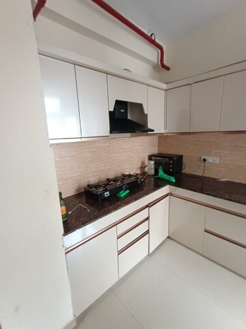 Kitchen in 2 BHK Apartment at Ansal API Celebrity Gardens, Sushant Golf City – for Rent