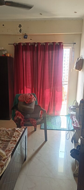 Living Room in 2 BHK Apartment at Gardenia Golf City, Sector 75 – for Sale