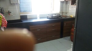 Kitchen in 2 BHK Apartment at D Kapoor Twinkle Apartment, Andheri West – for Rent