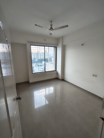 Room in 2 BHK Apartment at Gulmohar Goldcoast, Kharadi – for Rent