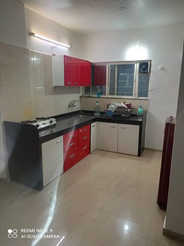 Kitchen in 3 BHK Apartment at G K Daffodils Housing Society, Pimple Saudagar – for Rent