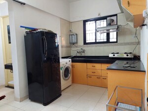 Kitchen in 1 BHK Apartment at Magarpatta City Heliconia, Hadapsar – for Rent