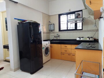 Kitchen in 1 BHK Apartment at Magarpatta City Heliconia, Hadapsar – for Rent