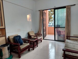 Living Room in 1 BHK Apartment at Magarpatta City Heliconia, Hadapsar – for Rent