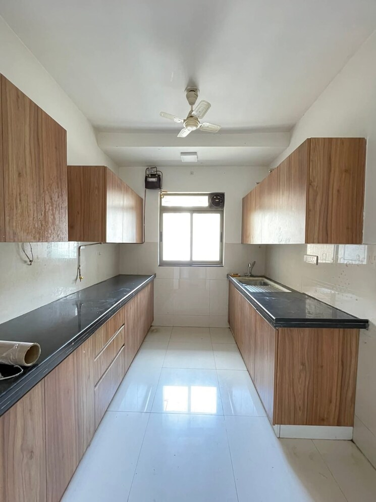 Kitchen, lodha-vivant 1.5 Bedroom 800 Sq.Ft. Apartment In Ghodbunder Road Thane 9408734