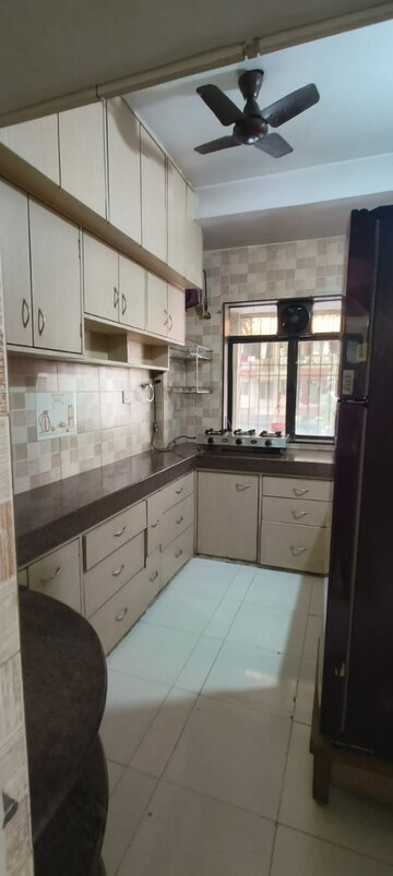 Kitchen in 1 BHK Apartment at Lokpuram CHS, Vasant Vihar – for Rent