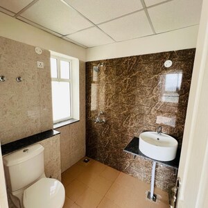 Bathroom in 3 BHK Apartment at Sushma Joynest MOH, Bir Chhat – for Rent