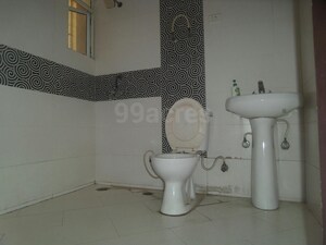 Bathroom in 3 BHK Apartment at Keltech Golf Vista, Dundahera – for Sale