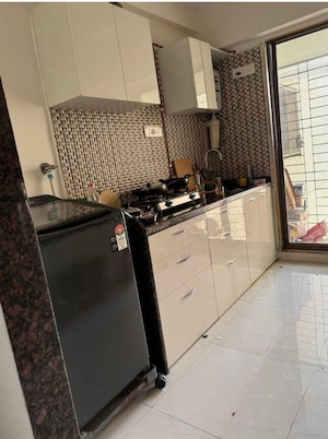Kitchen in 3 BHK Apartment at New India Grace Luxuria, Malad West – for Rent