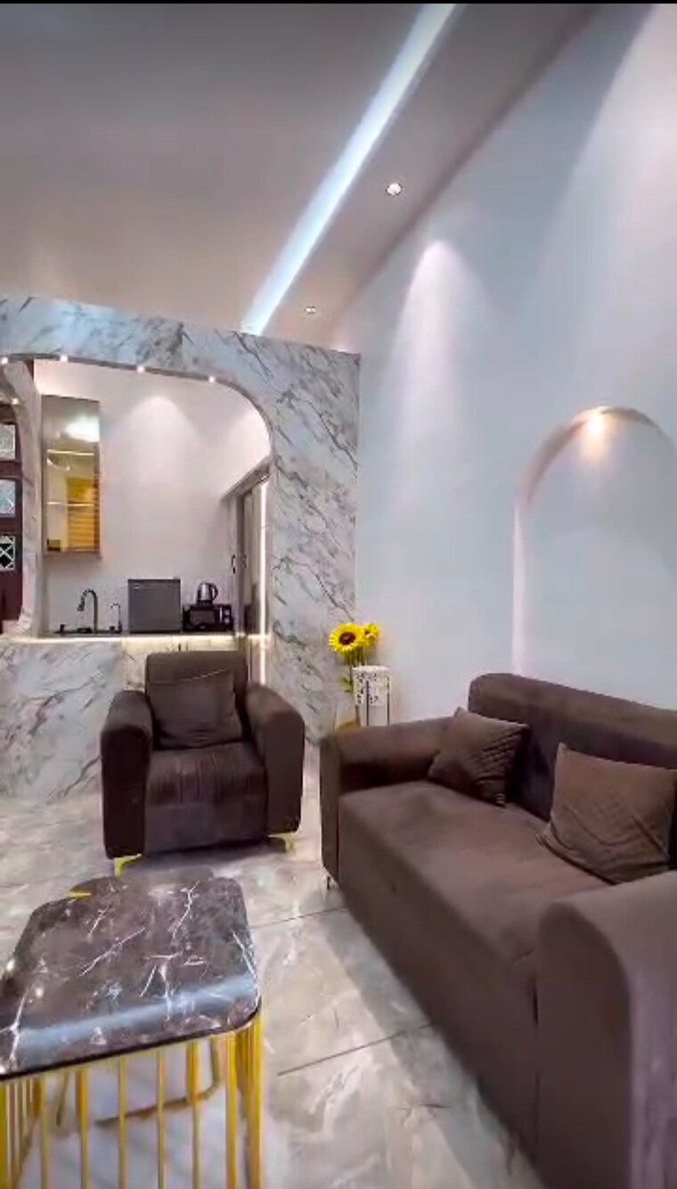 Living Room, concept-capital-the-core-mall Studio 666 Sq.Ft. Apartment In Crossing Republic Ghaziabad 9409803