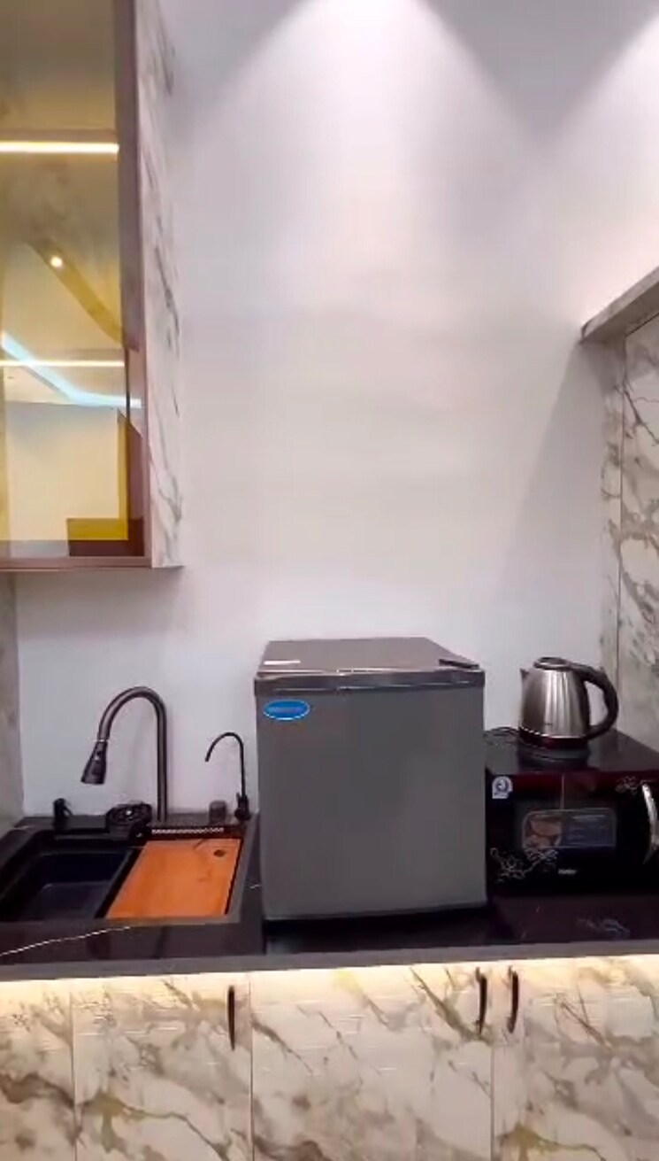 Kitchen, concept-capital-the-core-mall Studio 666 Sq.Ft. Apartment In Crossing Republic Ghaziabad 9409803