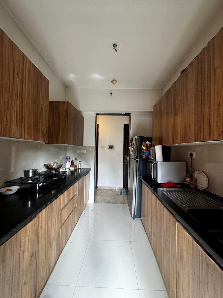 Kitchen, lodha-vivant 2 Bedroom 1125 Sq.Ft. Apartment In Ghodbunder Road Thane 9410427