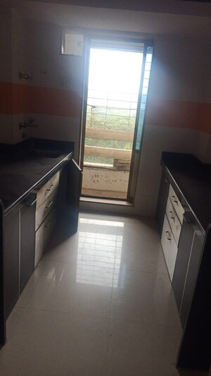 Kitchen in 1 BHK Apartment at Mahadev Complex, Mira Road – for Rent