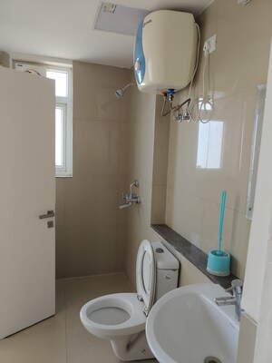 Bathroom in 3 BHK Apartment at Emaar Palm Gardens, Sector 83 – for Rent