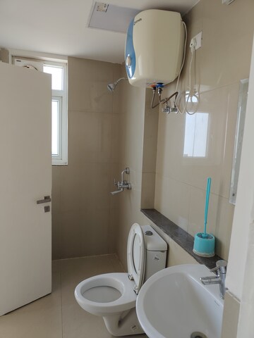 Bathroom in 3 BHK Apartment at Emaar Palm Gardens, Sector 83 – for Rent