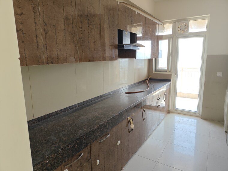 Kitchen, emaar-palm-gardens 3 Bedroom 1850 Sq.Ft. Apartment In Sector 83 Gurgaon 9411286