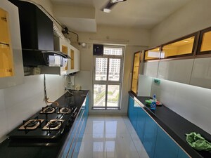 Kitchen in 3 BHK Apartment at Godrej Emerald, Ghodbunder Road – for Rent