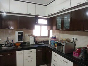 Kitchen in 3 BHK Apartment at Cosmos Jewels, Ghodbunder Road – for Rent