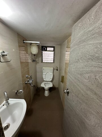 Bathroom in 1 BHK Apartment at Sethia Sea View, Goregaon West – for Rent