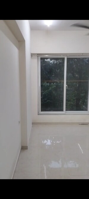 Room in 1 BHK Apartment at Ruparel Elara, Kandivali West – for Rent