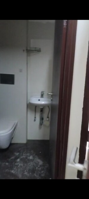 Bathroom in 1 BHK Apartment at Ruparel Elara, Kandivali West – for Rent