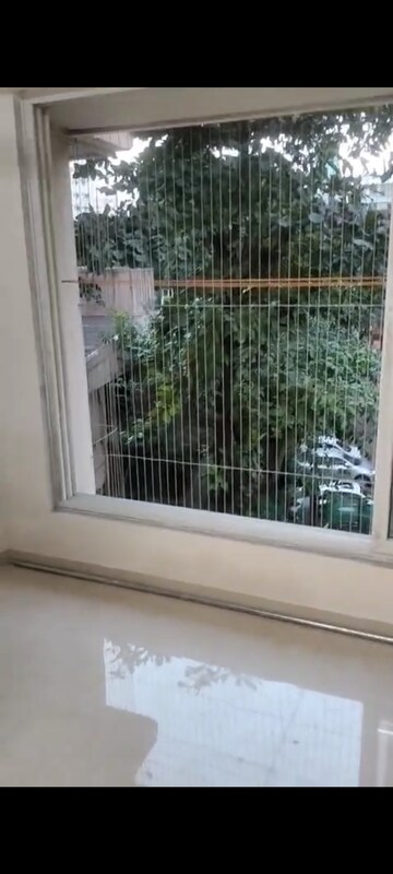 Bedroom in 1 BHK Apartment at Ruparel Elara, Kandivali West – for Rent