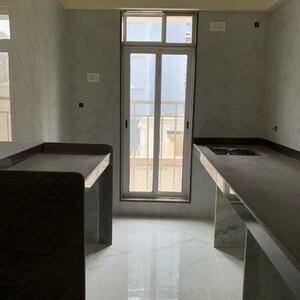 Kitchen in 1 BHK Apartment at Amar Om Vasudev CHS, Lic Colony – for Rent