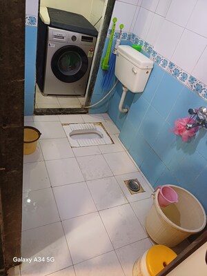 Bathroom in 2 BHK Apartment at Kopar Khairane – for Sale