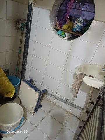 Bathroom in 2 BHK Apartment at Kopar Khairane – for Sale