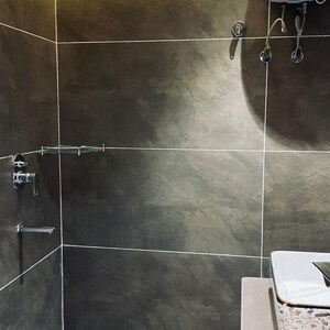 Bathroom in 4 BHK Apartment at Parsvnath Planet, Vibhuti Khand – for Rent