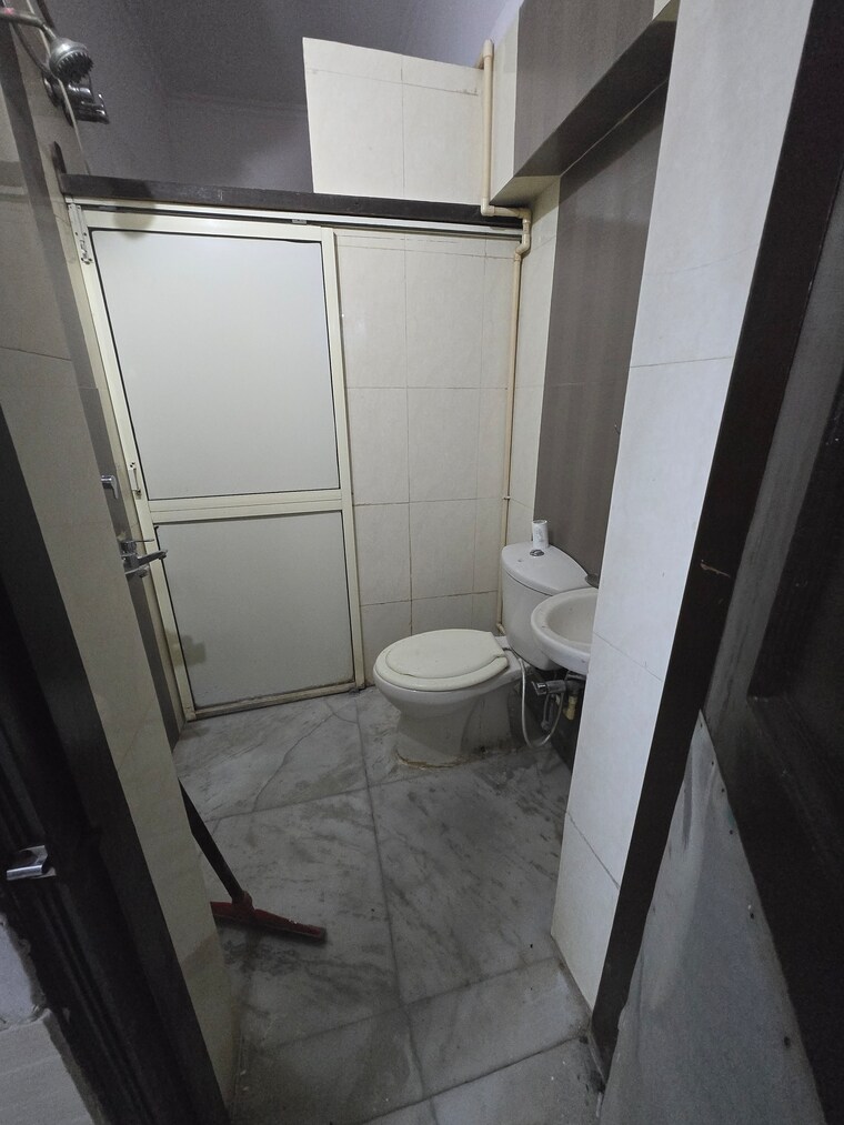 Kitchen, amar colony 2 Bedroom 900 Sq.Ft. Builder Floor In Amar Colony Delhi 9411774