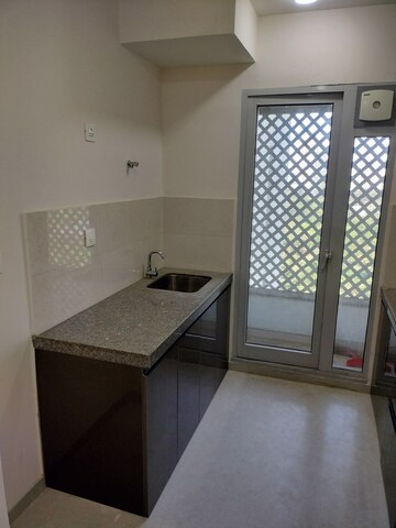 Kitchen in 2 BHK Apartment at Piramal Vaikunth, Balkum Pada – for Rent