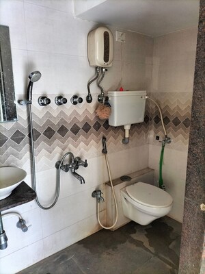 Bathroom in 1 BHK Apartment at Poonam Park View, Virar West – for Rent